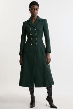 Discover The Elegance Of Premium Tailoring With Our Midaxi Coat, Featuring A Full Skirt And Military-Style Button Details. The Flowing Skirt Creates A Feminine Silhouette, Making It An Ideal Choice To Layer Over Dresses For Weddings Or Other Special Occasions. Elevate Your Ensemble With Our Midaxi Coat And Leave A Lasting Impression Wherever You Go. Premium Italian Manteco Wool Military Full Skirted Tailored Midaxi Coat Premium Italian Wool Fabric Double Breasted Military Style Buttons Tailored Olivia Pope Coats, Petite Work Outfits, Dress Work Outfit, Sequin Coats, Petite Wedding Guest Dresses, Jumpsuit For Wedding Guest, Tall Skirt, Plus Size Workwear, Dresses For Weddings