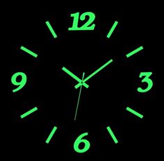 a green glow in the dark wall clock showing twelve o'clock to twelve o'clock