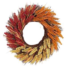 a dried wreath with red, yellow and orange flowers