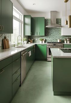 a kitchen with green cabinets and white counter tops