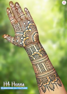 the hand is decorated with henna on it