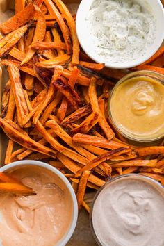 sweet potato fries with dipping sauces on the side