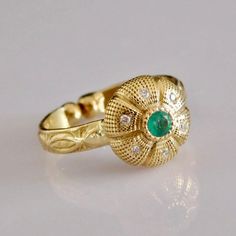 Celebrate elegance and symbolism with our 18k solid gold Peyotito cactus ring, featuring a pristine natural 3mm Colombian emerald and six VS SI brilliant quality 0.01ct diamonds. Each stone is ethically sourced, reflecting our commitment to responsible luxury. This ring offers size adjustments from 5 US to 7.5 US, and includes free worldwide shipping via insured DHL express to most countries. Custom orders are welcomed to create a personalized piece that suits your style. Benefits: Symbolic Desi Cactus Ring, Columbian Emeralds, Coral Pendant, Emerald Diamond Ring, Eu Countries, Solid Gold Ring, Colombian Emeralds, Solid Gold Rings, Jade Jewelry