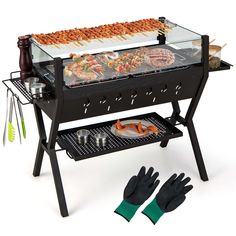 an outdoor grill with gloves and food on it