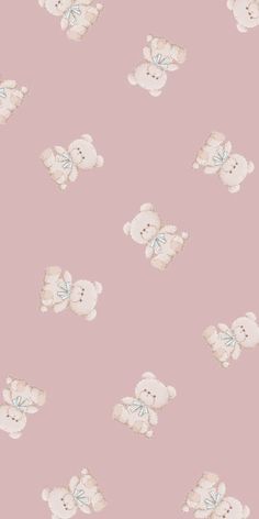 a pink background with white teddy bears on it