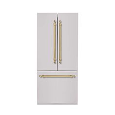 a white refrigerator freezer with gold handles and two golden handles on the door, in front of a white background