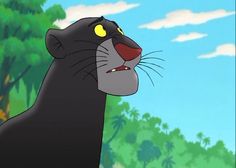 an animated black cat with yellow eyes staring at the viewer in front of some trees