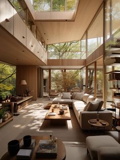 a living room filled with lots of furniture and tall glass windows over the top of it