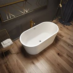 a white bath tub sitting on top of a hard wood floor next to a chair