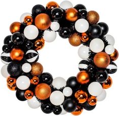 a wreath made out of black, white and orange balloons on a white background photo