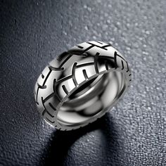 Celebrate your passion for automotive style with our Tires Ring, crafted from high-quality 925 sterling silver. This unique ring features a detailed tire tread pattern, symbolizing strength, durability, and a love for the open road. Perfect for those who appreciate bold and distinctive jewelry, this adjustable ring ensures a comfortable fit for any finger size. Handcrafted with exceptional attention to detail, the polished finish enhances the intricate design, giving the ring a timeless and capt Tire Rings, Tire Tread, Viking Ring, Masonic Ring, Retro Ring, Animal Rings, Cross Ring, Everyday Rings, Handmade Rings