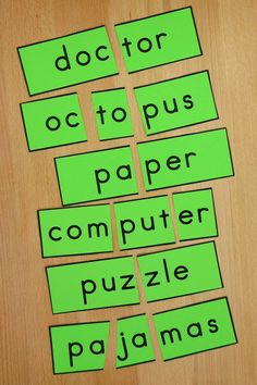 several pieces of green paper cut out to spell words