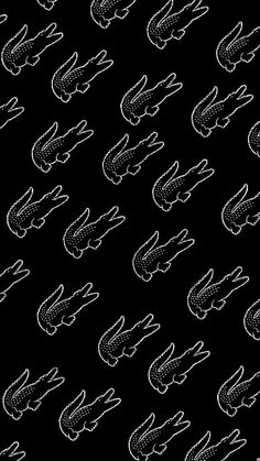 black and white alligators pattern on a black background