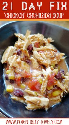 chicken enchilada soup in a black bowl with text overlay that reads 21 day fix chicken enchilada soup