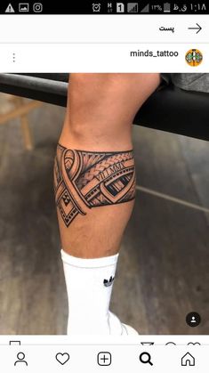 a man with a tattoo on his leg