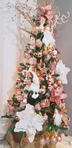 a decorated christmas tree with ornaments and lights