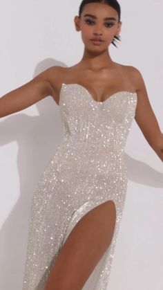 Strapless Embellished Sequin Evening Dress, Glamorous Strapless Sleeveless Dress For Gala, Elegant Strapless Sequin Dress For Gala, Strapless Sequin Dress For Evening Formal, Glamorous Glitter Mini Dress For Evening, Glamorous Strapless Embellished Sequin Dress, Strapless Evening Sequin Dress For Gala, Floor-length Glitter Dress For Night Out, Sparkling Strapless Dress For Prom