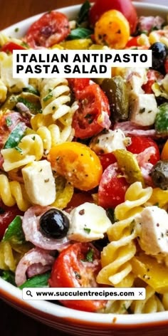 a pasta salad with tomatoes, olives and mozzarella