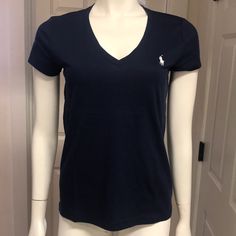 Great V-Neck Athletic/Athleisure Top By Polo Ralph Lauren! In A Preppy And Versatile Navy Blue, This Top Has An Iconic Embroidered Logo At The Left Chest. Lightweight Fabric Clings In All The Right Places For A Flattering Fit. A Classic! Size Small (Armpit To Armpit: 17.5” Length: 23”) Available. New With Tags! Vintage Polo Outfit Women, Vintage Polo Outfit, Cute Fitted Ralph Lauren Tops, Ralph Lauren Outfits Women, Preppy Ralph Lauren Button-up Tops, Ralph Lauren V Neck, Blue Ralph Lauren Cotton Tops, Blue Ralph Lauren Shirt, Ralph Lauren Denim Shirt