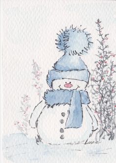 a drawing of a snowman with a blue hat and scarf