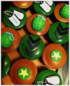 cupcakes decorated with green and orange frosting