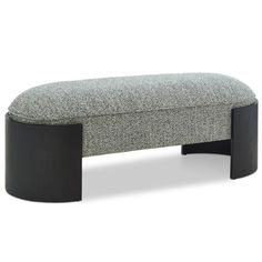 a grey bench with black legs and a gray seat cushion on the bottom, sitting in front of a white background