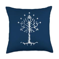 a blue pillow with a white tree on it