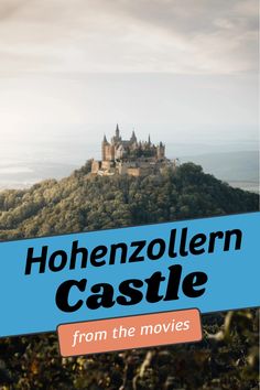 Hohenzollern Castle perched on a hill with trees surrounding it, under a cloudy sky. Lichtenstein Castle