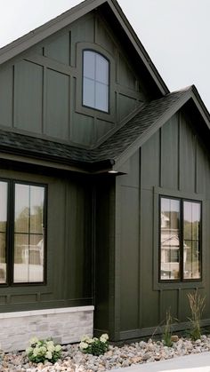 Dark Exterior House Color Pallet, Dark English Cottage Exterior, Exterior House Colors Dark Green, Dark Olive Green Exterior Paint, Alabaster And Black Exterior, Dark Grey Green House Exterior, Green Exterior With Black Trim, Dark Green House Exterior With Wood, Dark Green Metal Siding