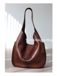 100% Nature Top layer Genuine Leather with Waxed. 100% Handmade. Materials: Genuine leather, High quality leather, Durable genuine leather ,inside is the High quality pure cotton Two colors : Brown ,Black  FEATURES: - Height: 10.63 inches (27 cm) - Length: 12.2 inches (31 cm) - Handles: 11.02 inches (28 cm) - Bottom width:3.94 inches (10 cm) - Bag weight 0.55 kg - 2 interior and 2 exterior pockets NOTE: PLEASE LEAVE A CONTACT PHONE NUMBER FOR DELIVERY THROUGH Express. ●I and my sister Daisy are Unusual Christmas Gifts, Leather Hobo Bags, Leather Handbags Women, Hobo Bags, Handbags Women, Etsy Personalized Gifts, Leather Hobo Bag, Hobo Handbags, Cute Bags