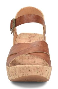 A cushioned footbed and adjustable slingback strap bring customized comfort to a sandal lifted by a cork-wrapped platform and wedge heel. 2 3/4" heel; 1" platform Synthetic upper/textile lining/rubber sole Imported Comfortable Wedges Sandals, Most Comfortable Sandals, Comfortable Wedges, Cork Heels, Wedges Sandals, Straw Bags, Flip Flop Slippers, Clutch Pouch, Designer Crossbody Bags