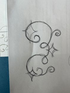 a drawing of an animal with swirls on it's back