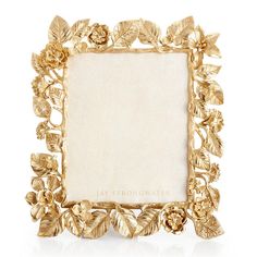 an ornate gold frame with leaves and flowers on the edges is shown in front of a white background