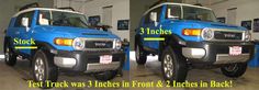 two trucks parked side by side in a garage with the words stock 3 inches front and 2 inches back