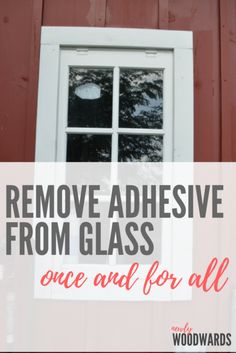 a window with the words remove adhesive from glass once and for all on it