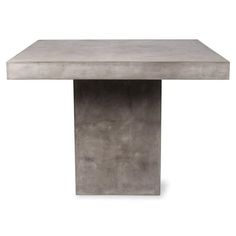 a concrete table with a square shaped base