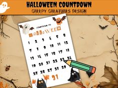 a calendar with bats and cats on it, next to a pencil that says happy halloween