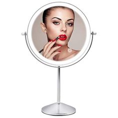 a woman's face is reflected in a round mirror with a lipstick on it