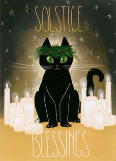 a black cat sitting in front of candles with the words solstice on it