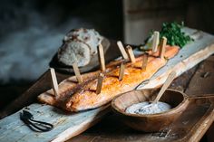 some food is laying out on a wooden table