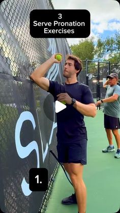 a man holding a tennis ball on top of a tennis court