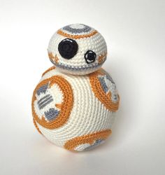 a crocheted star wars bbg toy on a white surface