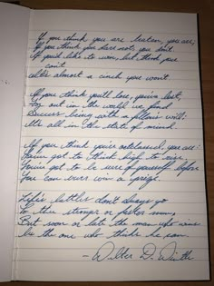 an old handwritten letter is shown in blue ink