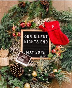 a wreath with a sign that says our silent nights end may 2019