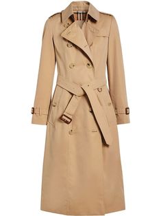 Our slim-fit trench coat reimagined with narrow shoulders and a nipped-in waist. The fitted archive-inspired style is made in England in our signature gabardine with a Vintage check lining and undercollar. Wear it belted to accentuate the softly flared silhouette. POSITIVELY CONSCIOUS: By buying this cotton product from Burberry, you’re supporting more responsibly grown cotton through the Better Cotton Initiative. | Burberry The Long Chelsea Heritage Trench Coat Burberry Trenchcoat, Burberry Outfit, Burberry Trench, Burberry Trench Coat, Beige Coat, Long Trench, Long Trench Coat, Belted Trench Coat, Leather Trench Coat