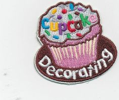 a patch with the words cupcake decorated on it