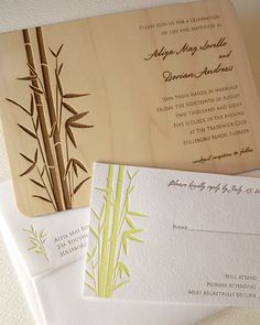 the wedding stationery is laid out on top of each other