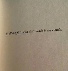 an open book with the words to all the girls with their heads in the clouds