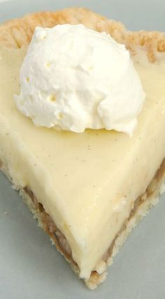 a piece of pie with whipped cream on top