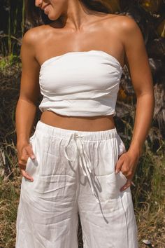 FINAL SALE. Elevate your summer style with our strapless set made from high-quality woven fabric. Stay cool and stylish all weekend long with this must-have matching set. Casual Tube Top With Elastic Waistband For Day Out, Spring Tube Top With Elastic Waistband For Day Out, Versatile Bandeau Bottoms For Spring, Casual Strapless Tube Top For Day Out, Summer Strapless Tube Top, White Spaghetti Straps Tube Top For Summer, Casual Bandeau Tube Top With Elastic Waistband, Casual Bandeau Tube Top, Cotton Strapless Tube Top For Summer